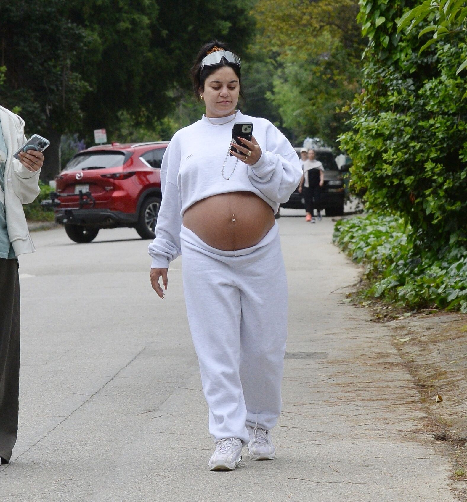 Vanessa Hudgens with huge pregnant belly out for a hike in LA