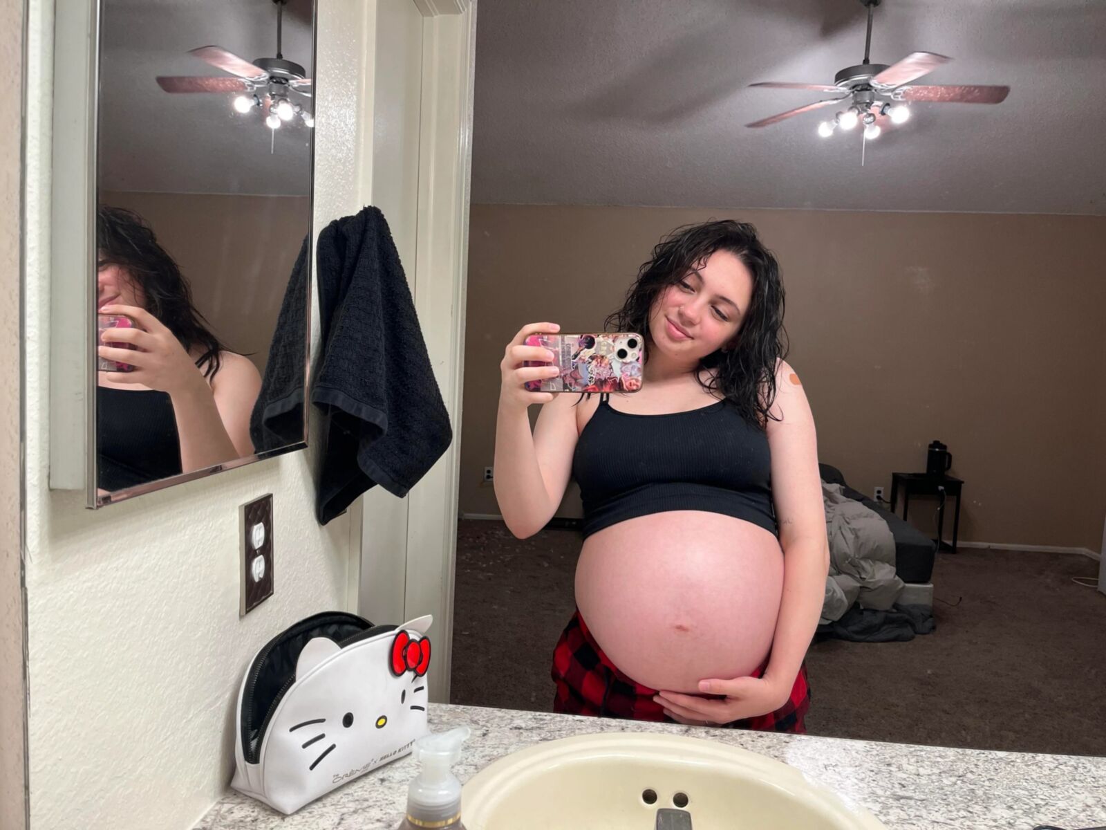 Pregnant young mom at home