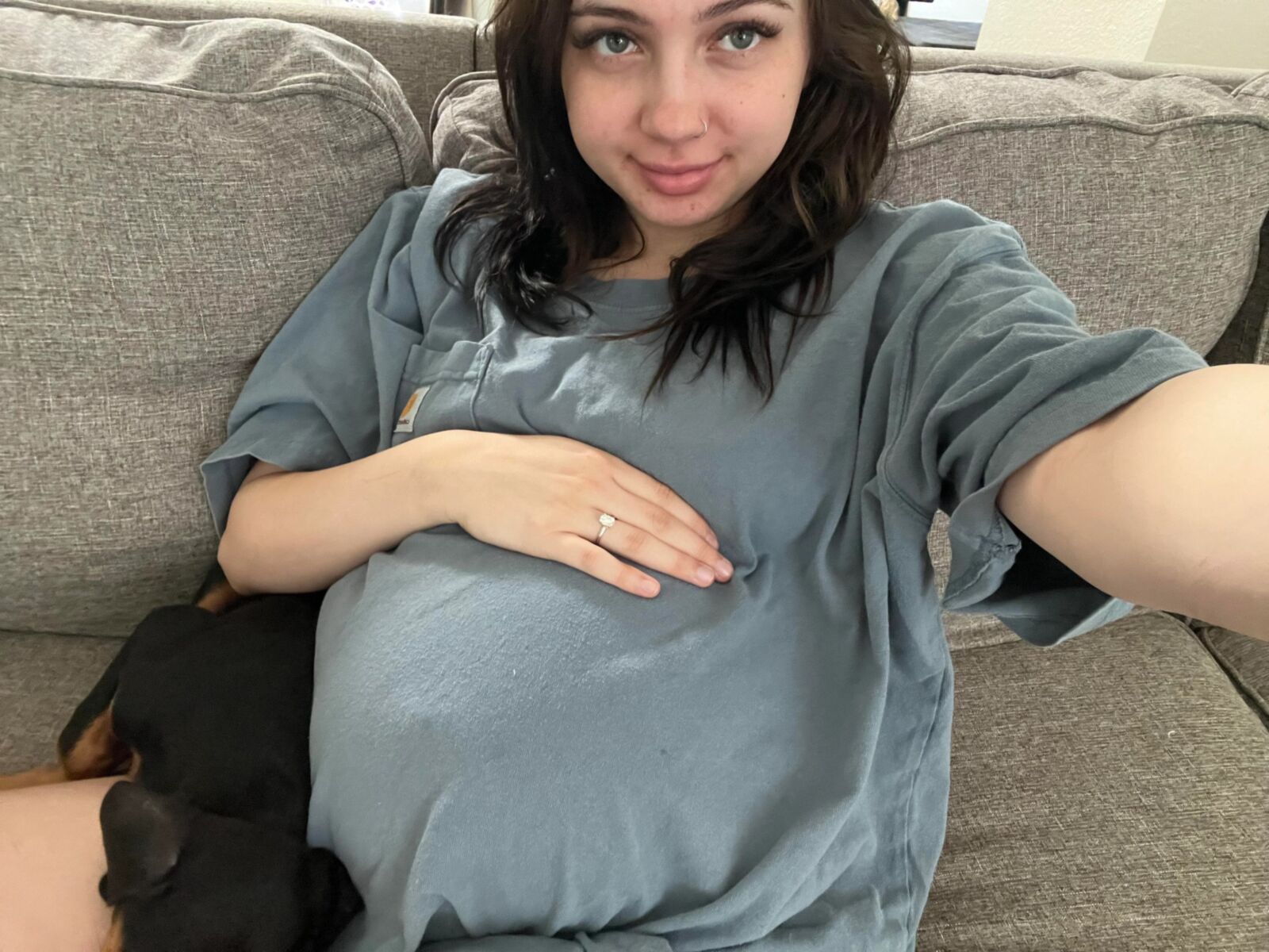 Pregnant young mom at home