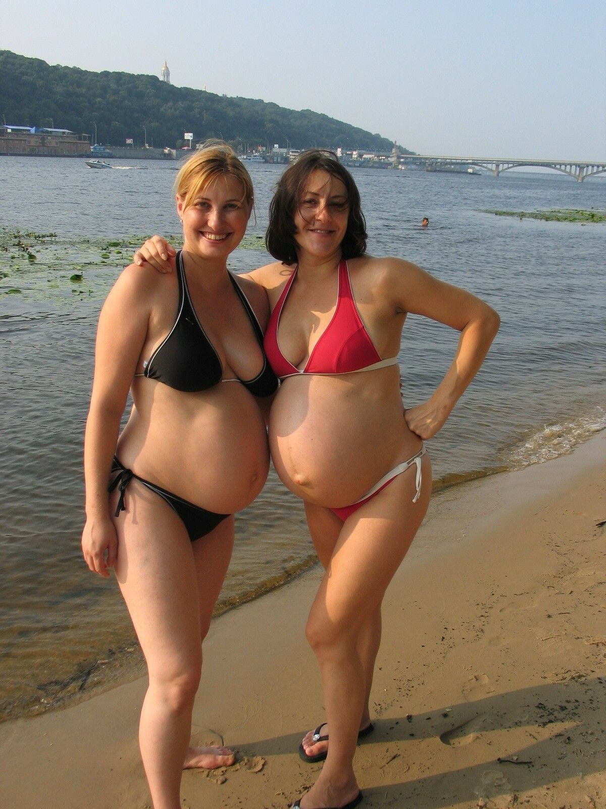 April 24 pregnant in swimwear