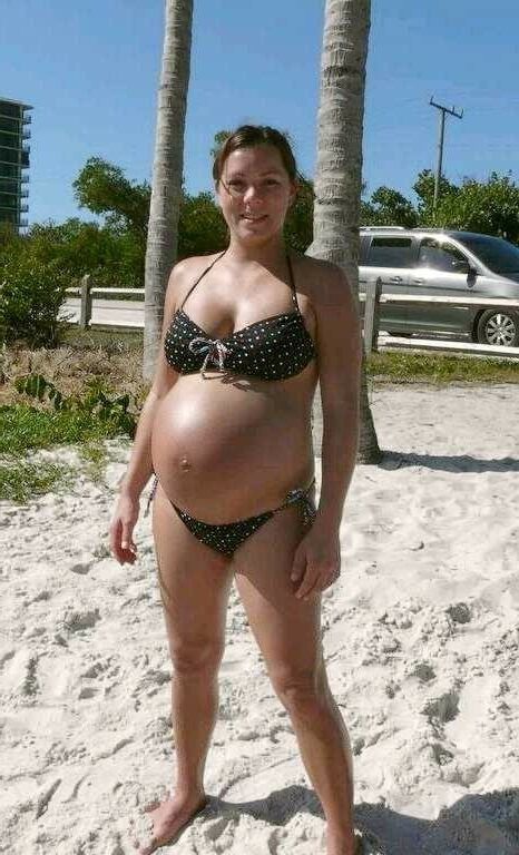 April 24 pregnant in swimwear