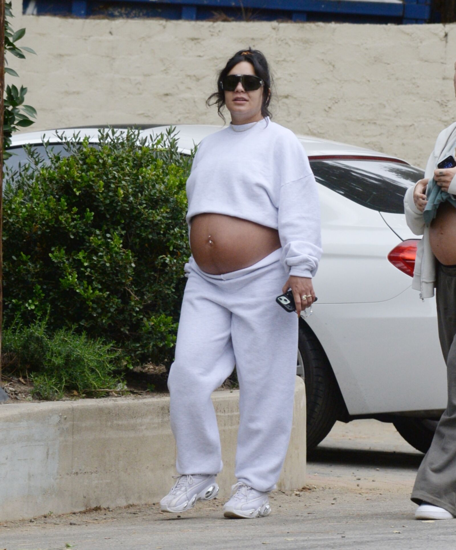 Vanessa Hudgens with huge pregnant belly out for a hike in LA