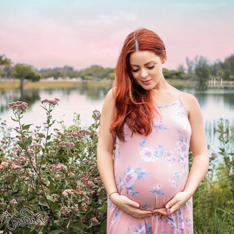 Pregnant redhead