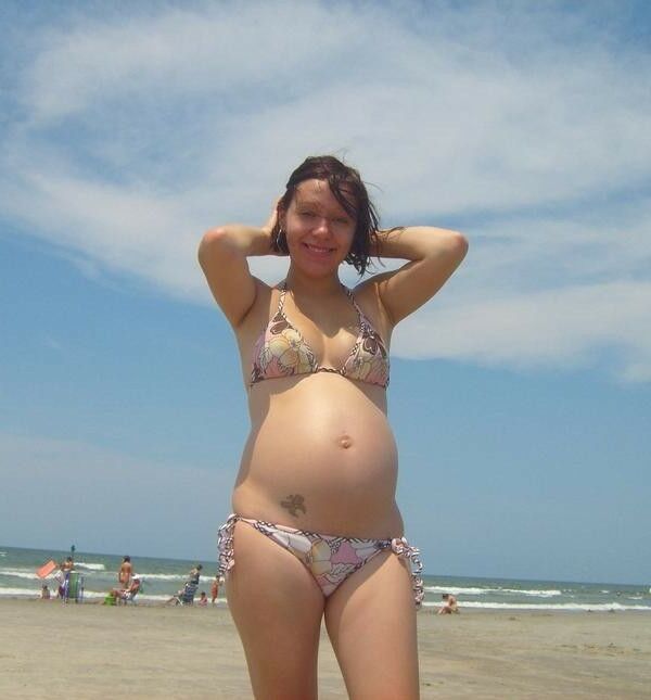 April 24 pregnant in swimwear