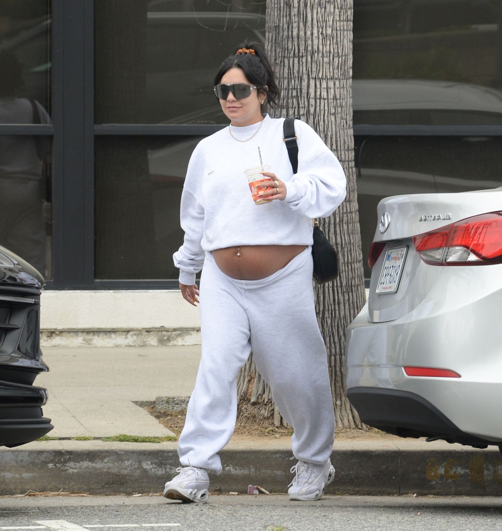 Vanessa Hudgens with huge pregnant belly out for a hike in LA