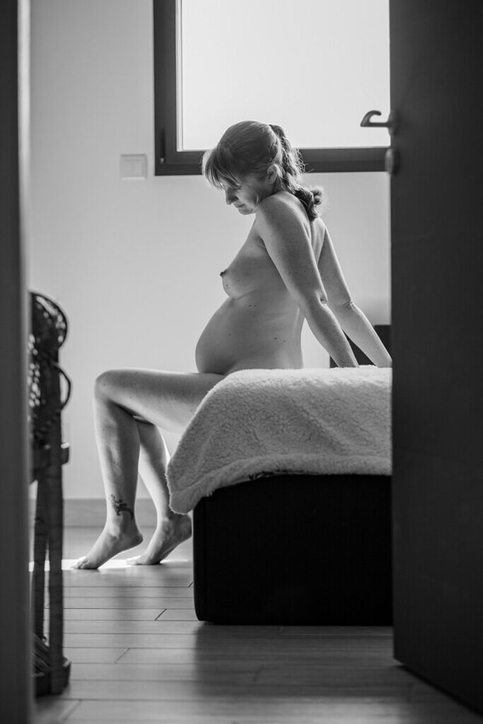 Naked pregnant mom at home