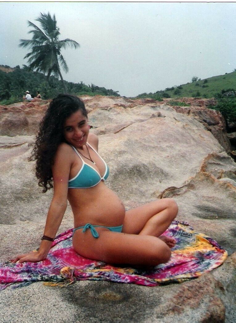 April 24 pregnant in swimwear