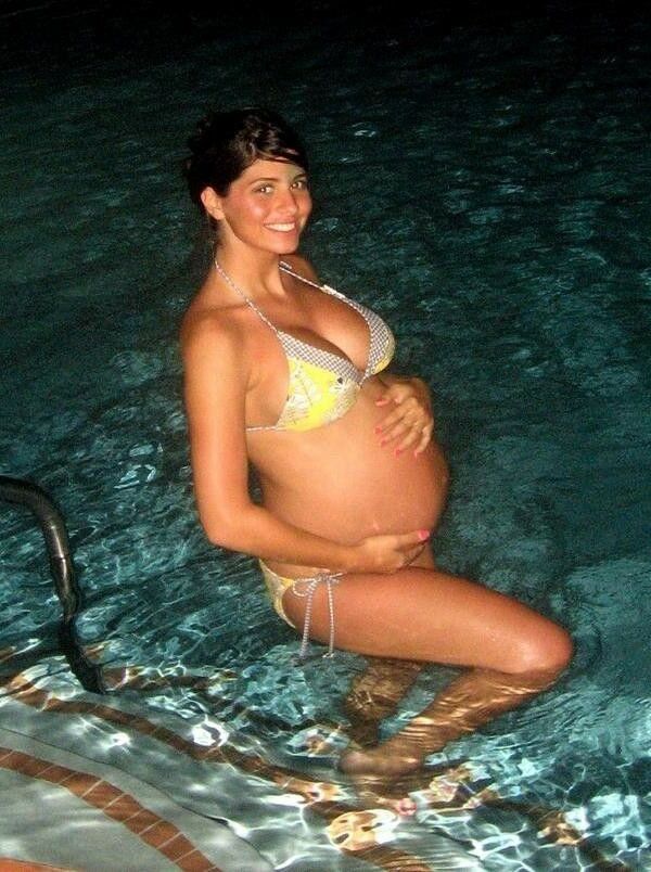 April 24 pregnant in swimwear