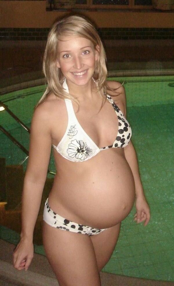 April 24 pregnant in swimwear