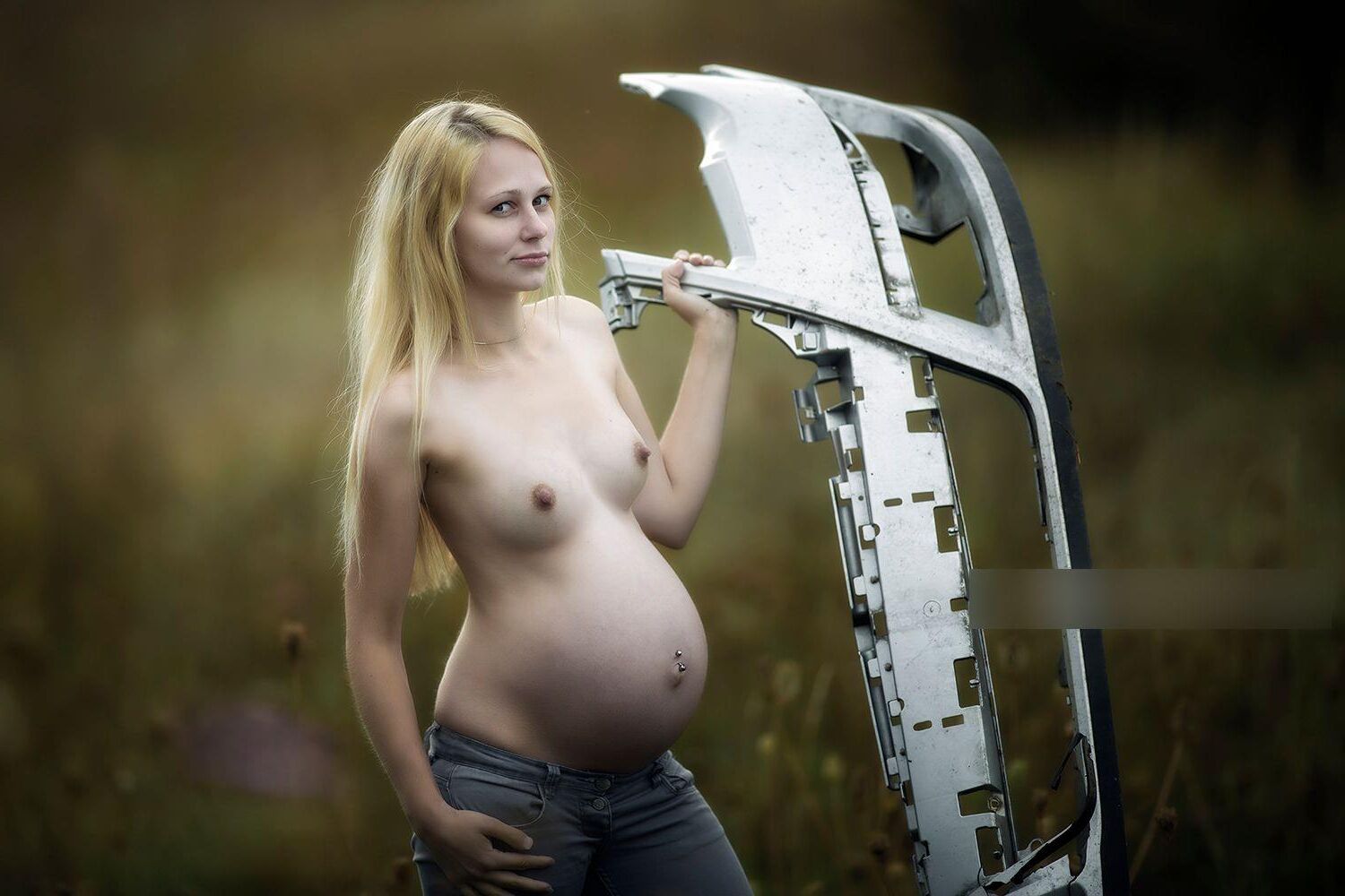 Hot photo shoot of a young pregnant blonde