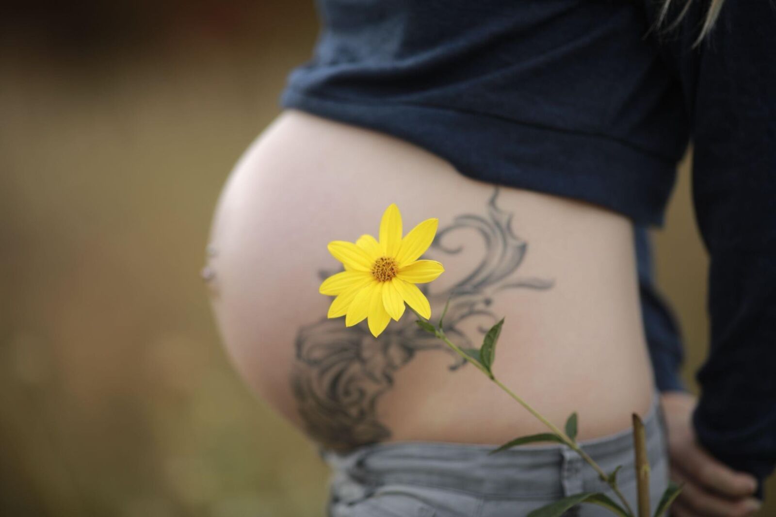 Hot photo shoot of a young pregnant blonde