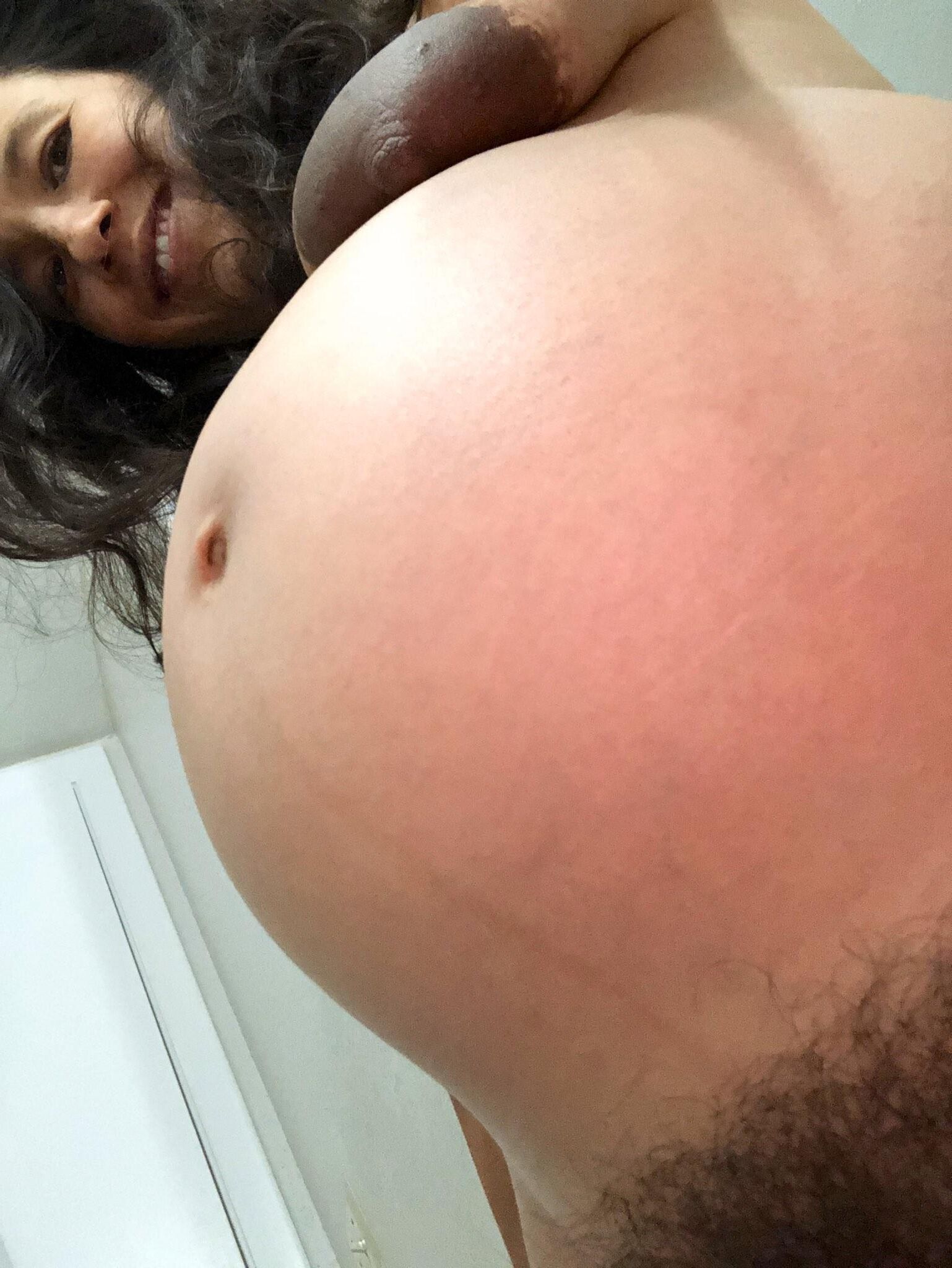 Pregnant slut with big tits