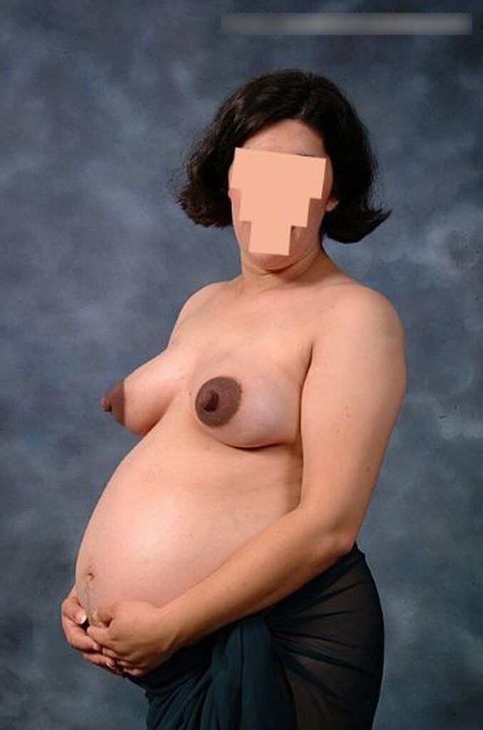 Photo shoot of a naked and anonymous pregnant woman