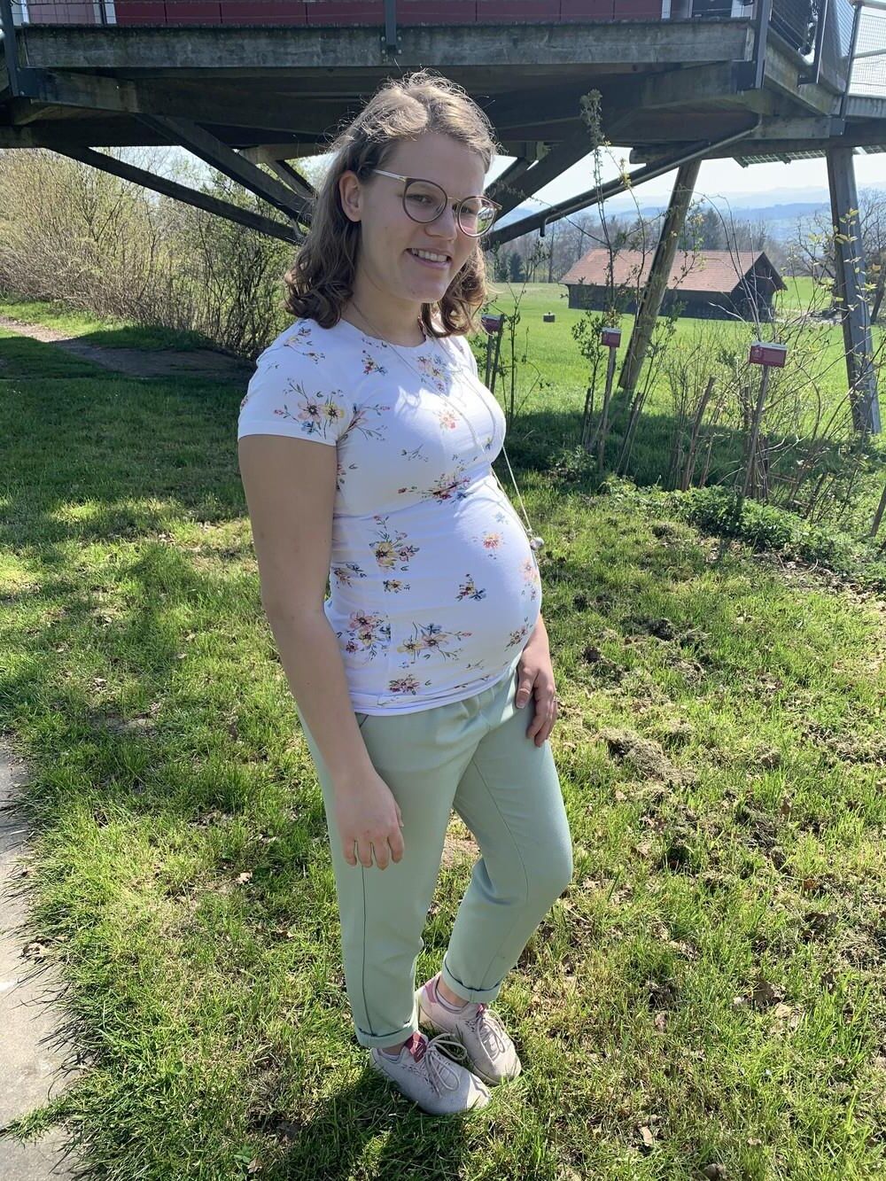 Young mom proud to show off her pregnancy