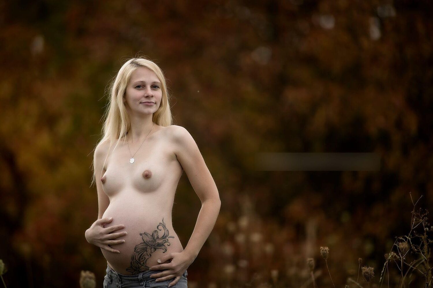 Hot photo shoot of a young pregnant blonde