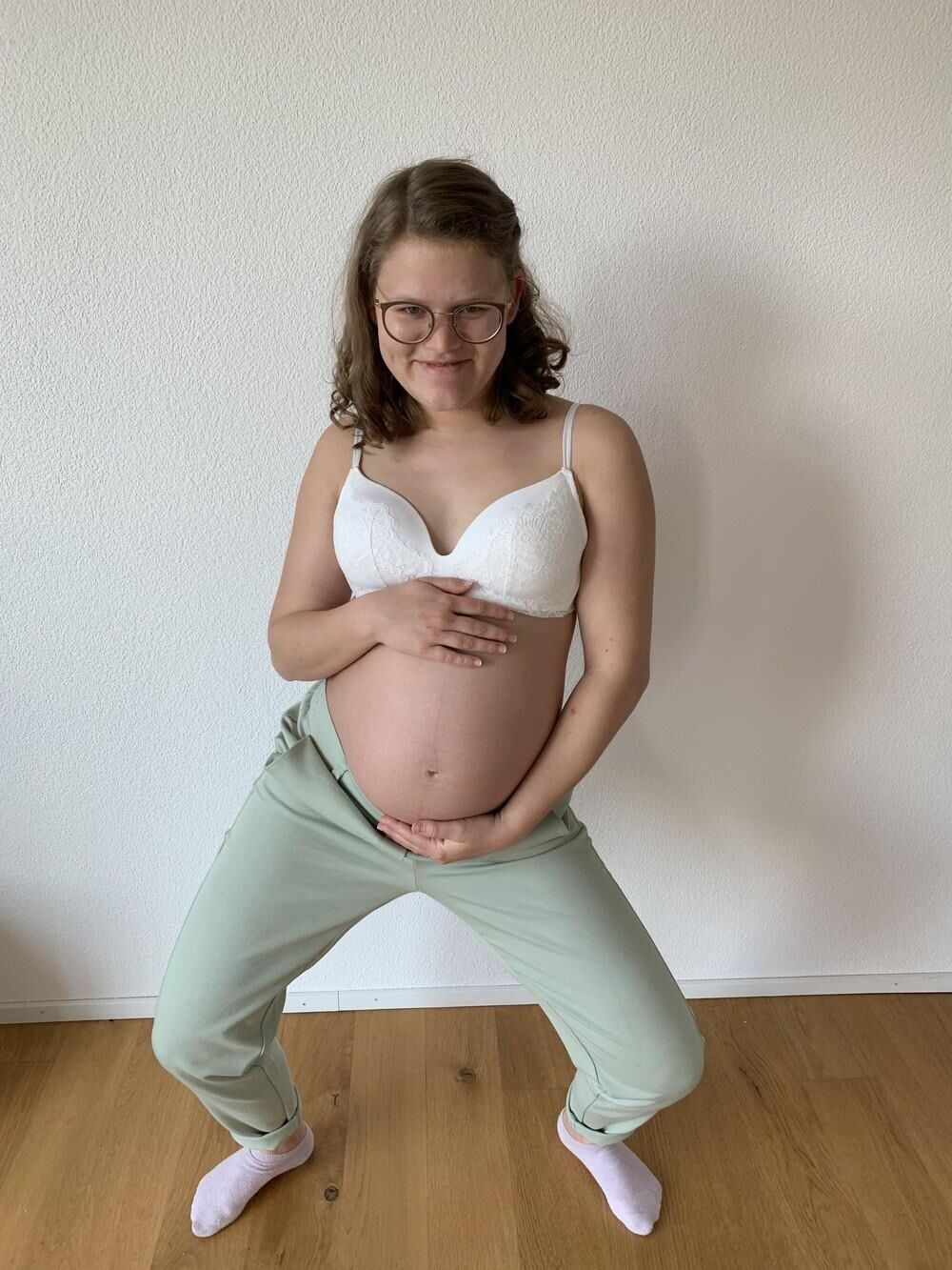 Young mom proud to show off her pregnancy