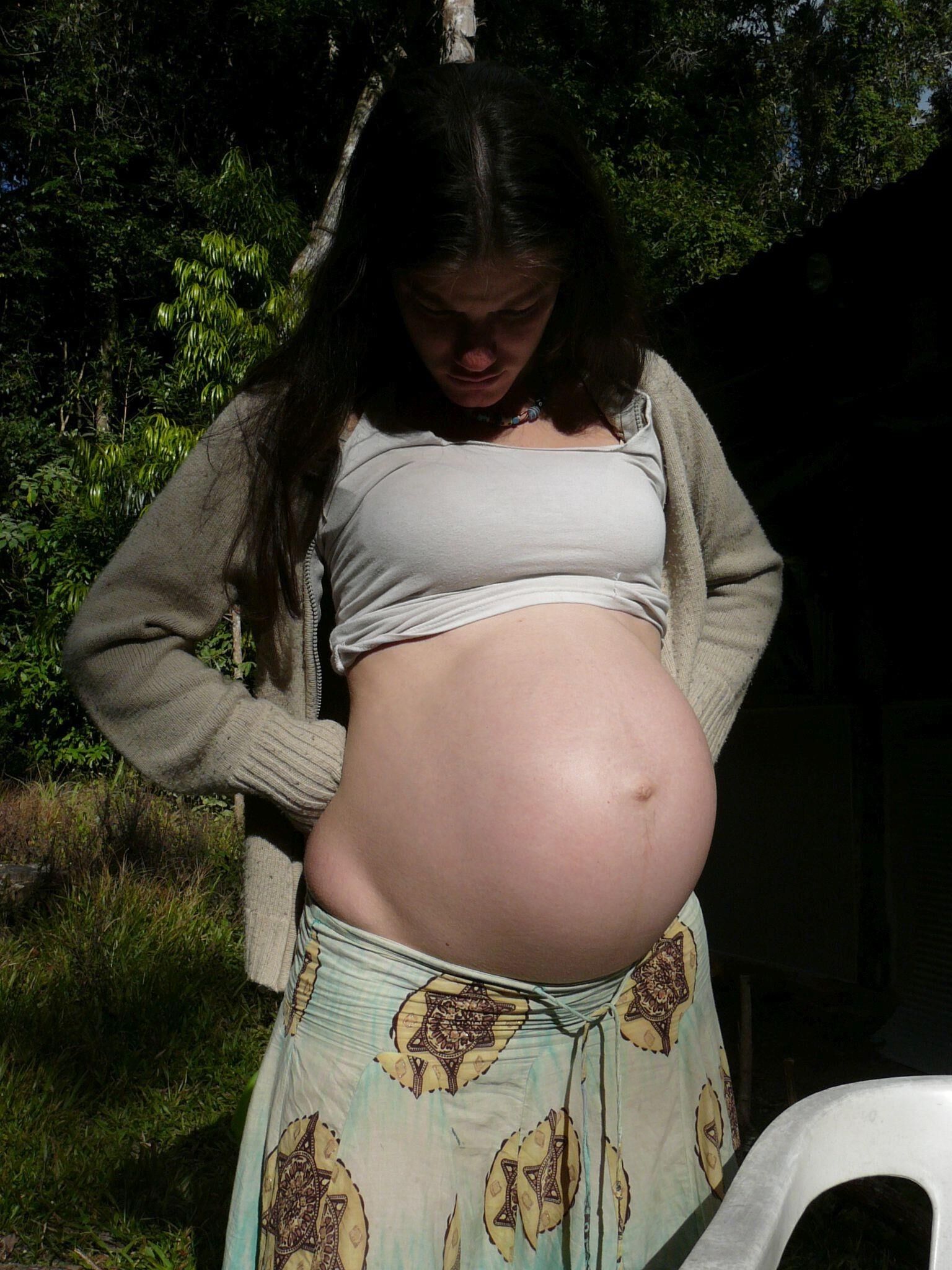 Pregnant girl in nature