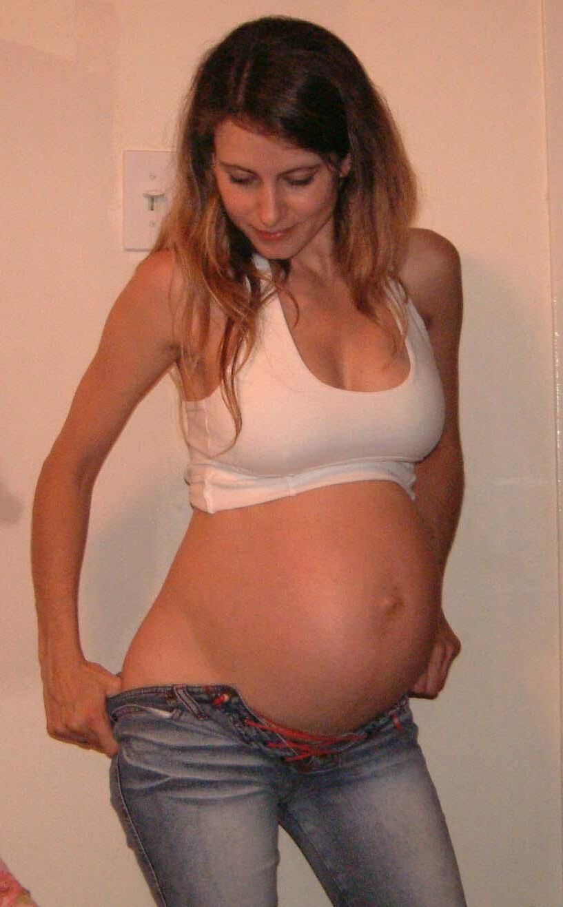 Happy young pregnant woman