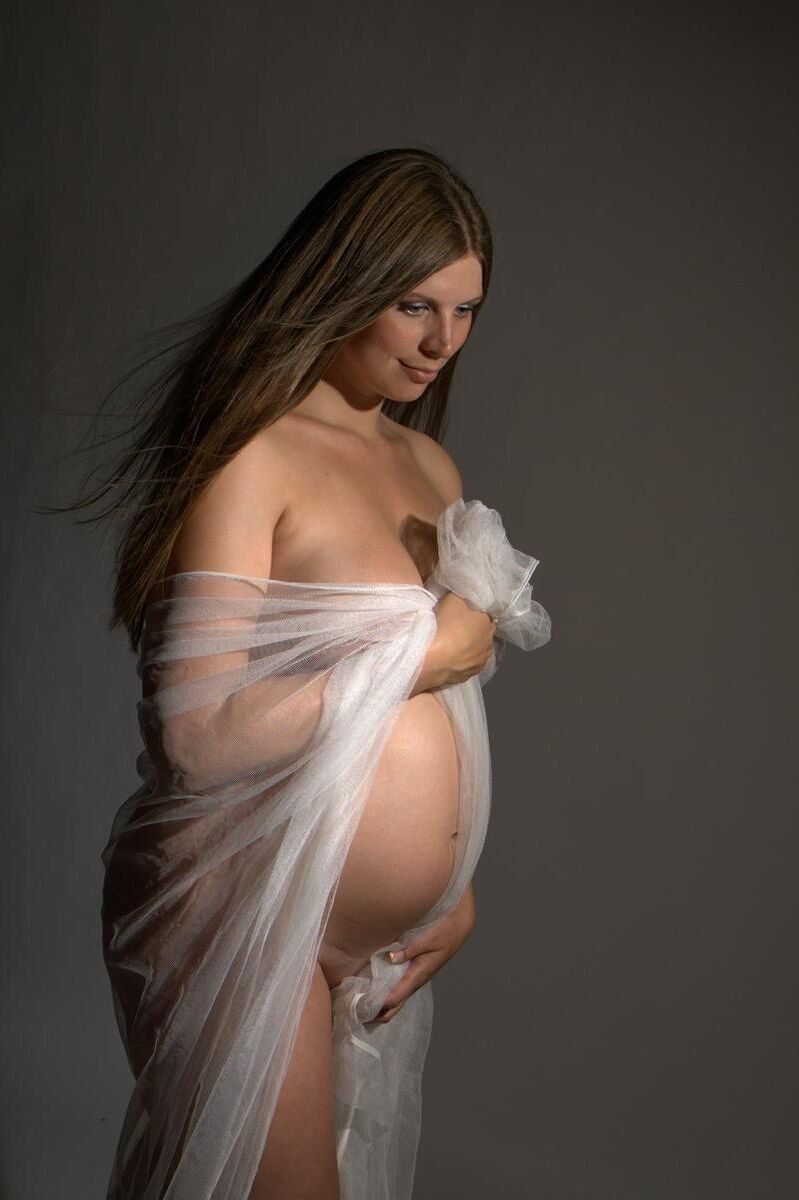 [Pregnant] sensual photo shoot of a young woman