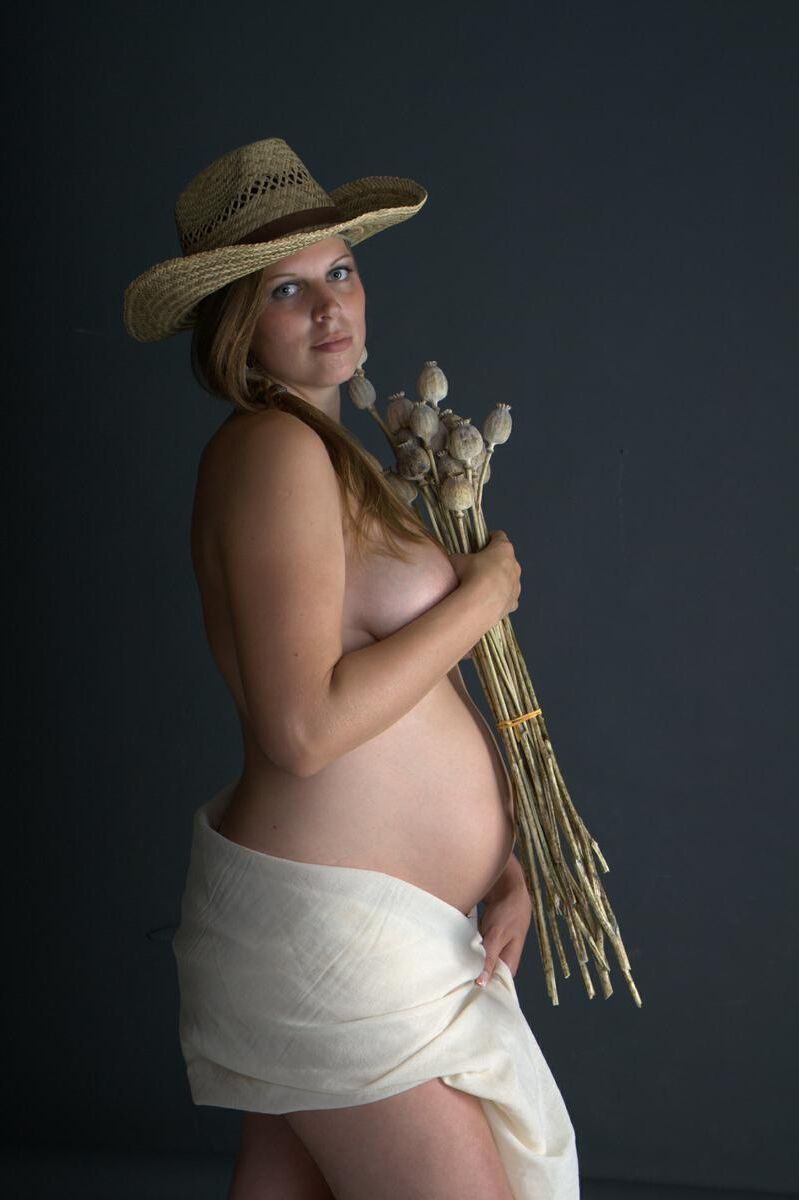 [Pregnant] sensual photo shoot of a young woman