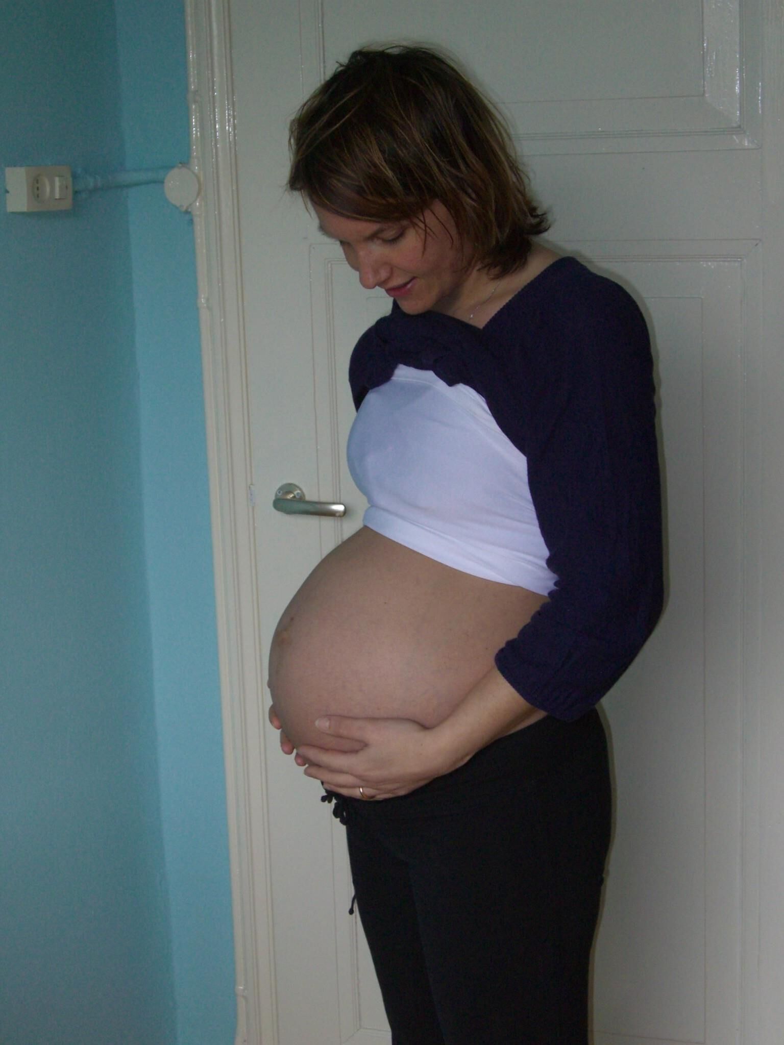 Mature pregnant woman reveals herself