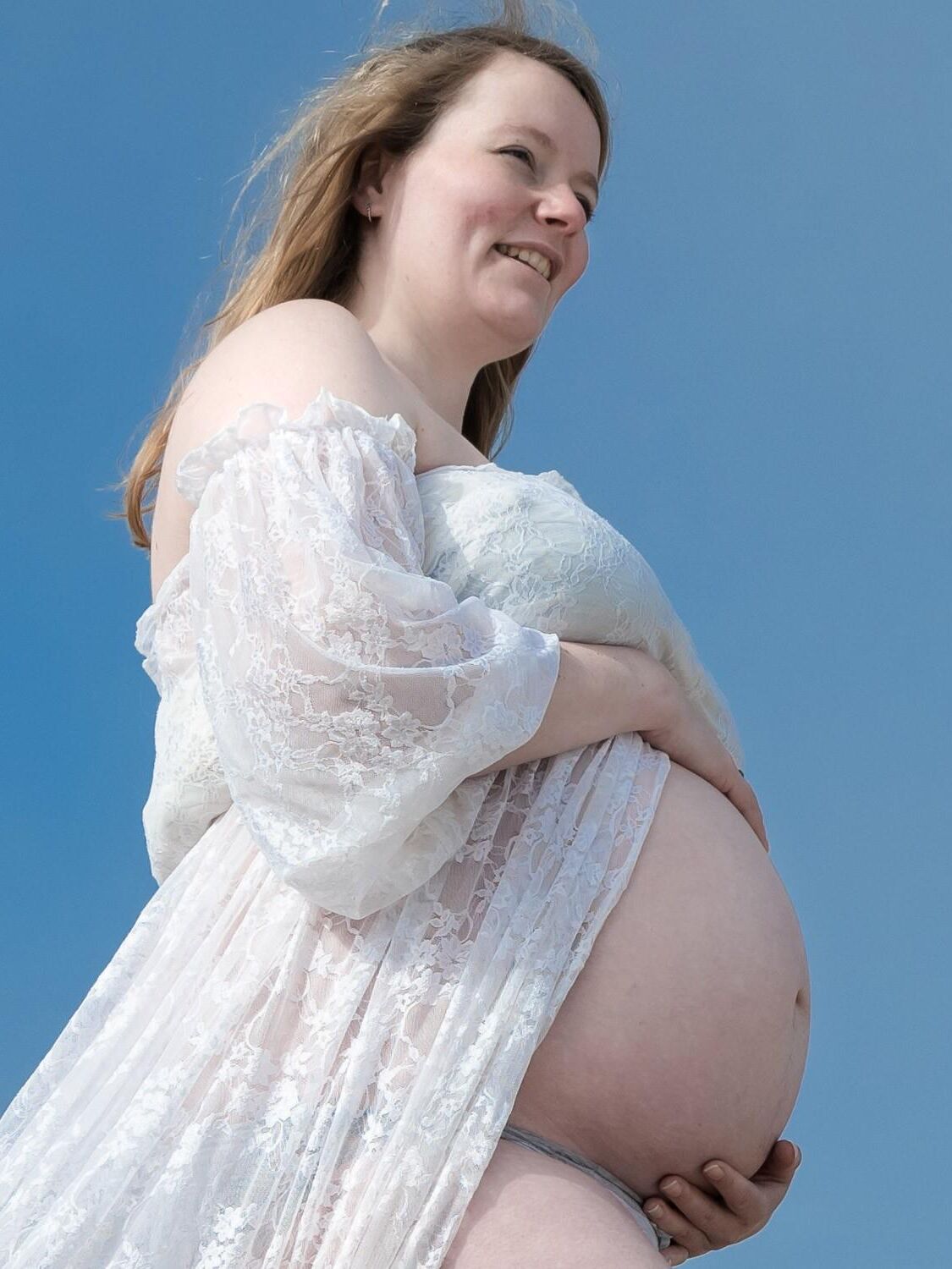 Lovely Pregnant Girl Posing Outdoors