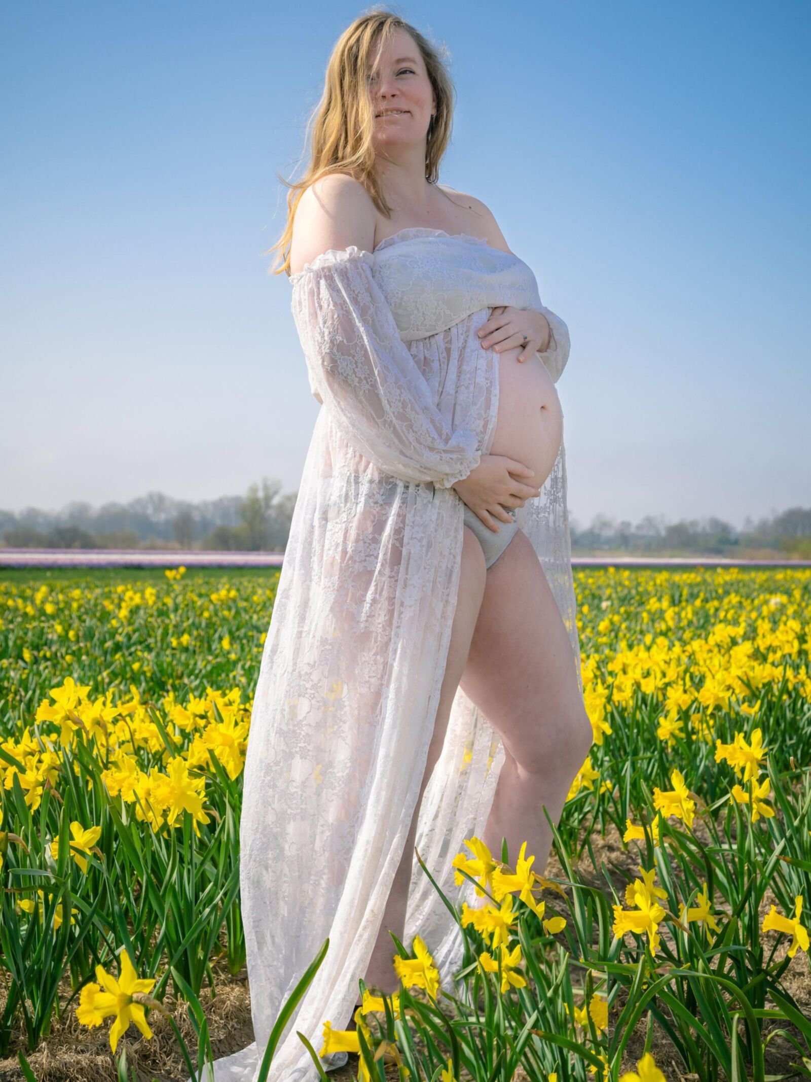 Lovely Pregnant Girl Posing Outdoors