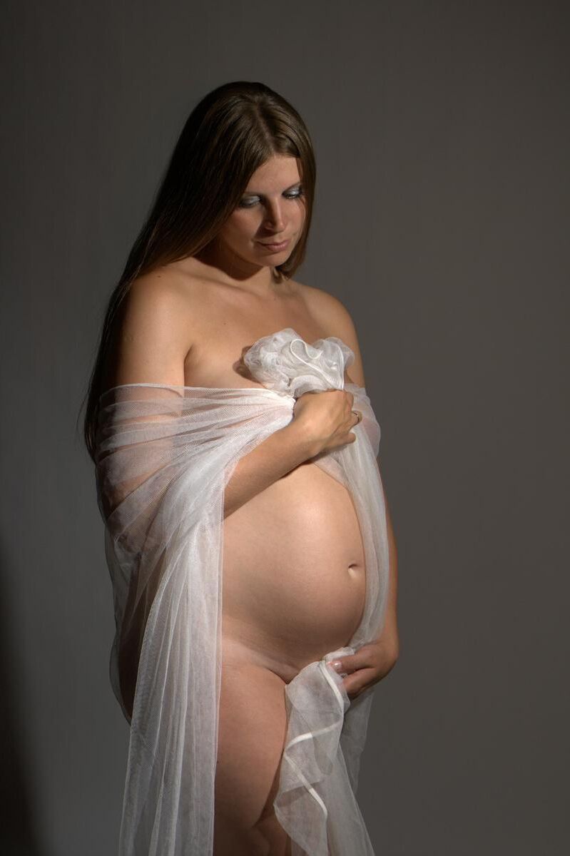 [Pregnant] sensual photo shoot of a young woman