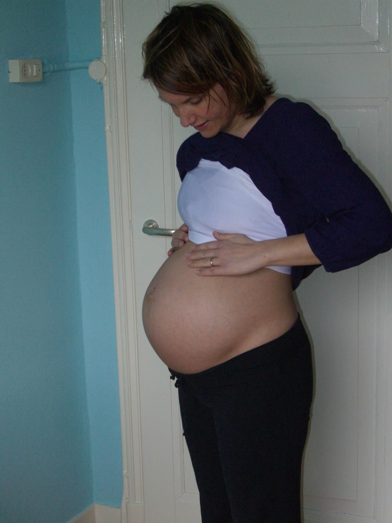 Mature pregnant woman reveals herself