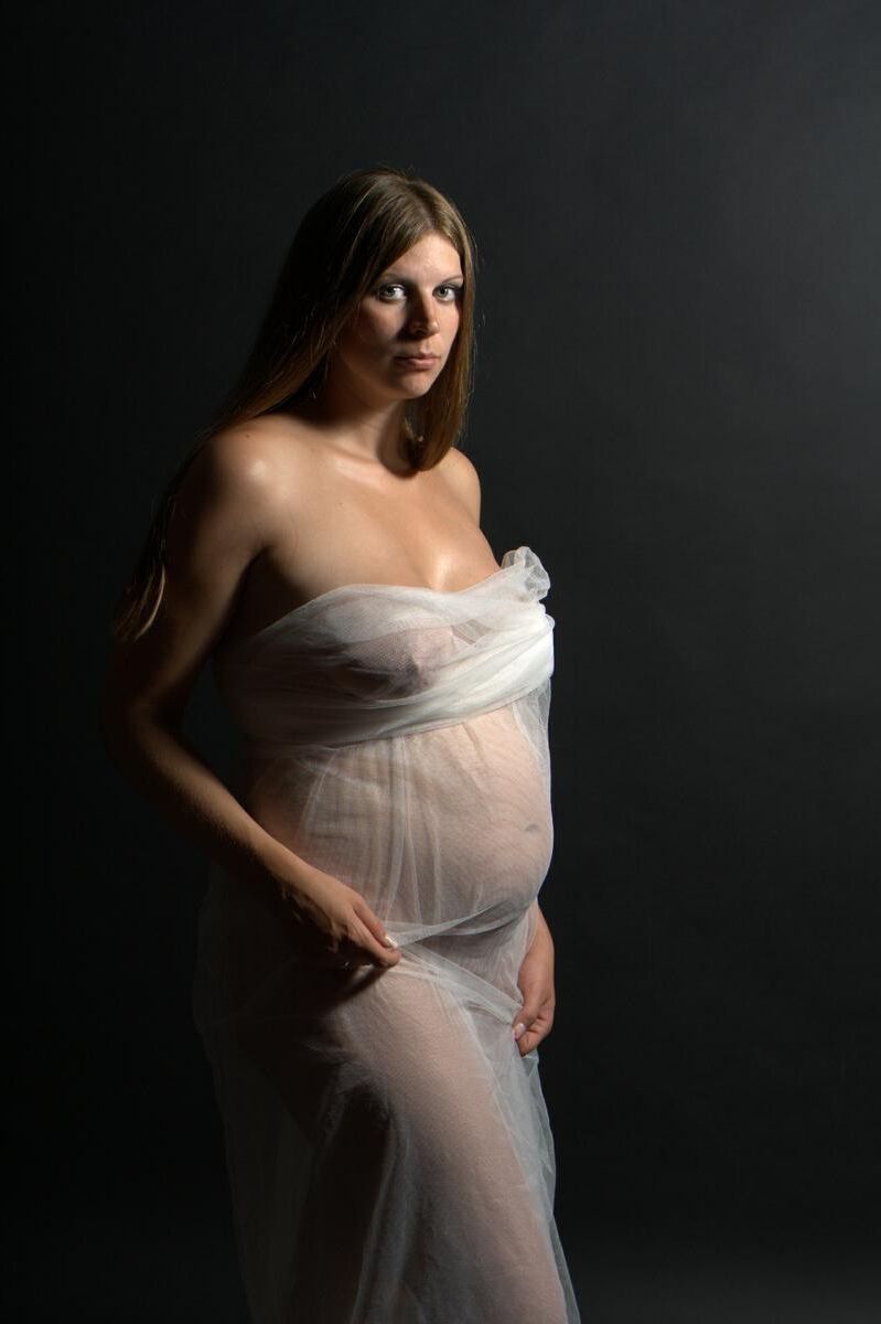 [Pregnant] sensual photo shoot of a young woman