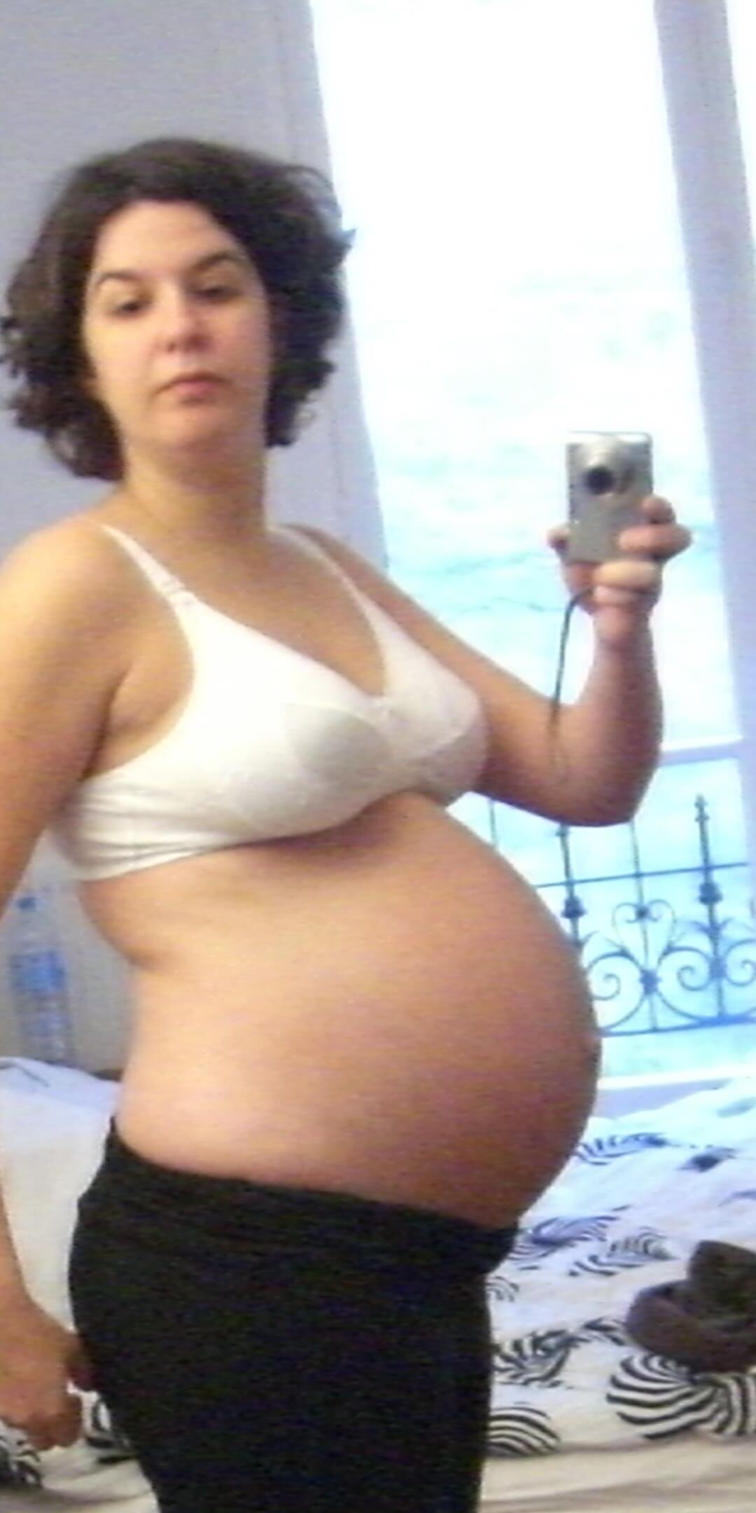 Pregnant big round boobs