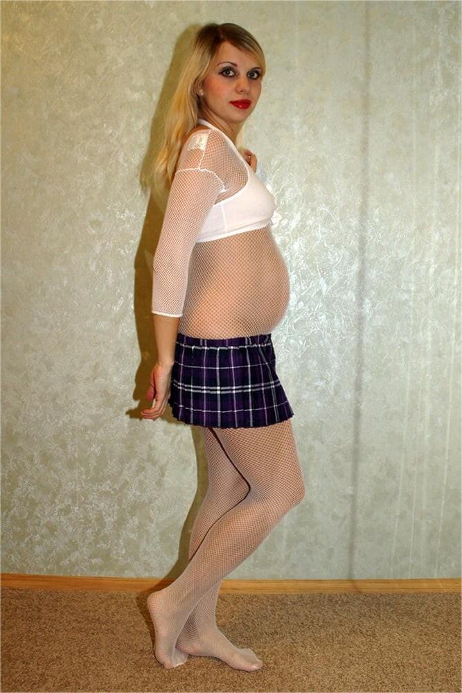 Pregnant girl fucking posing