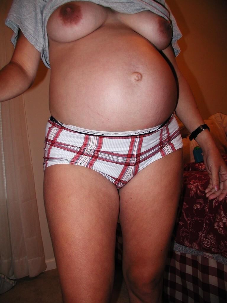 hot pregnant girl posing naked