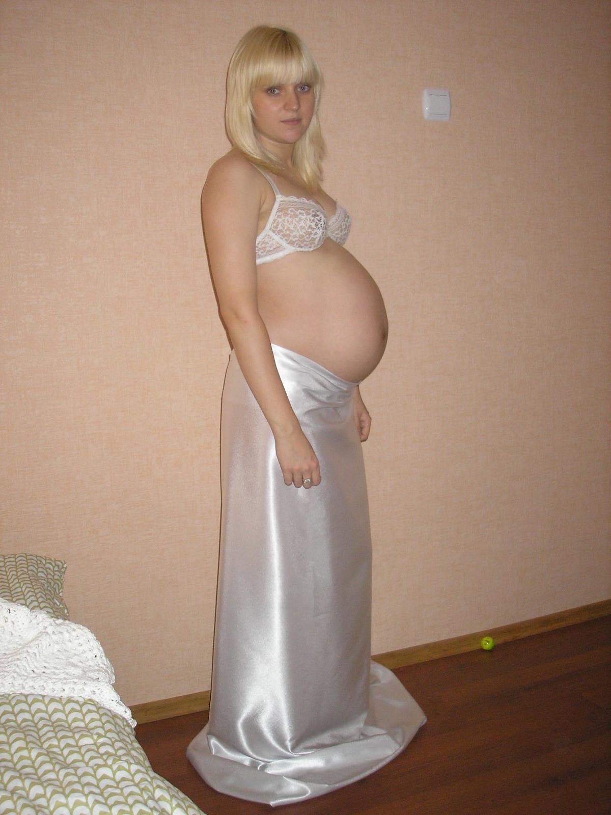 blonde pregnant teen shows her nice body