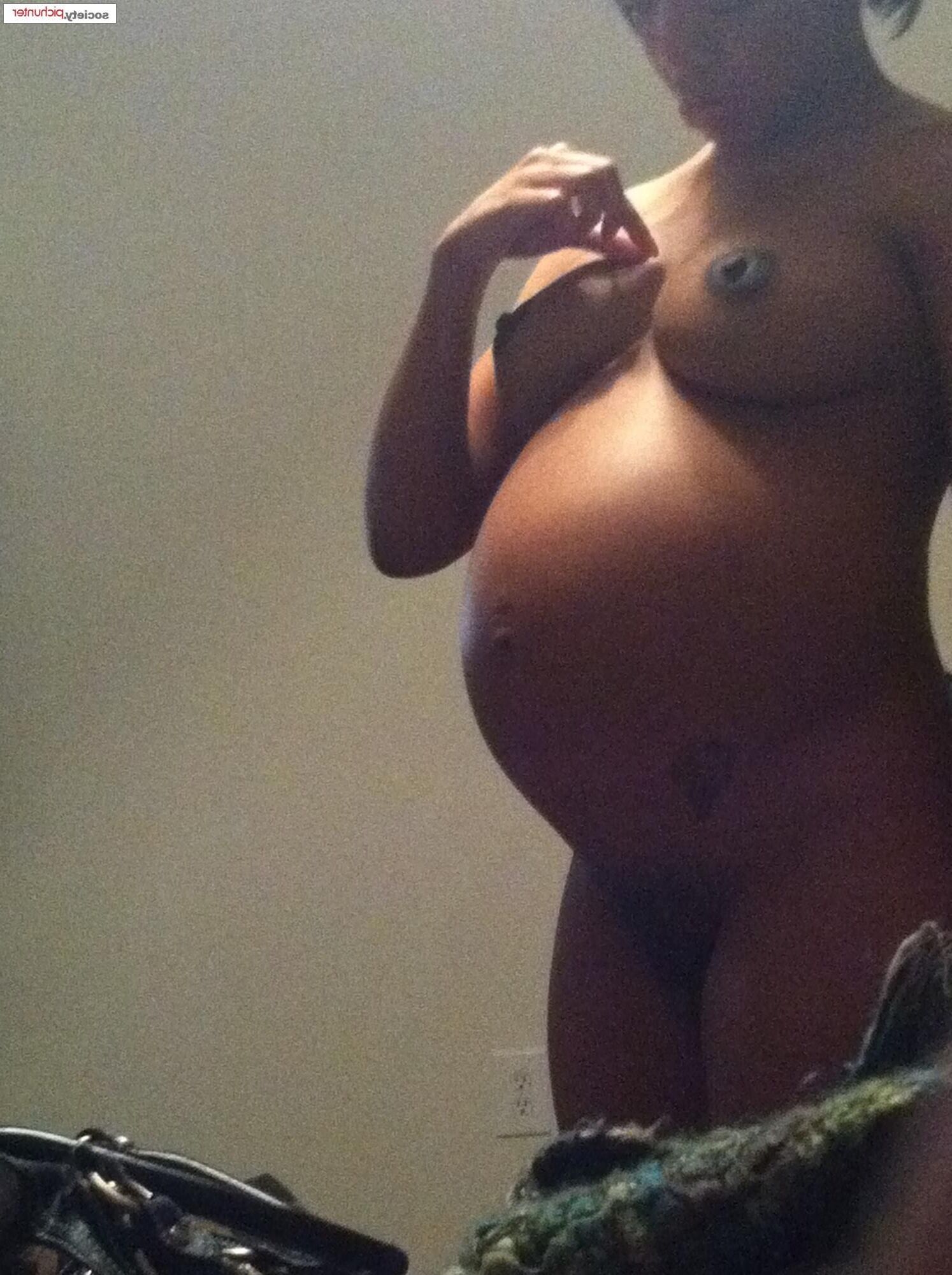 Pregnant black girl in the shower