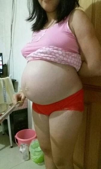 Asian Pregnant Wife