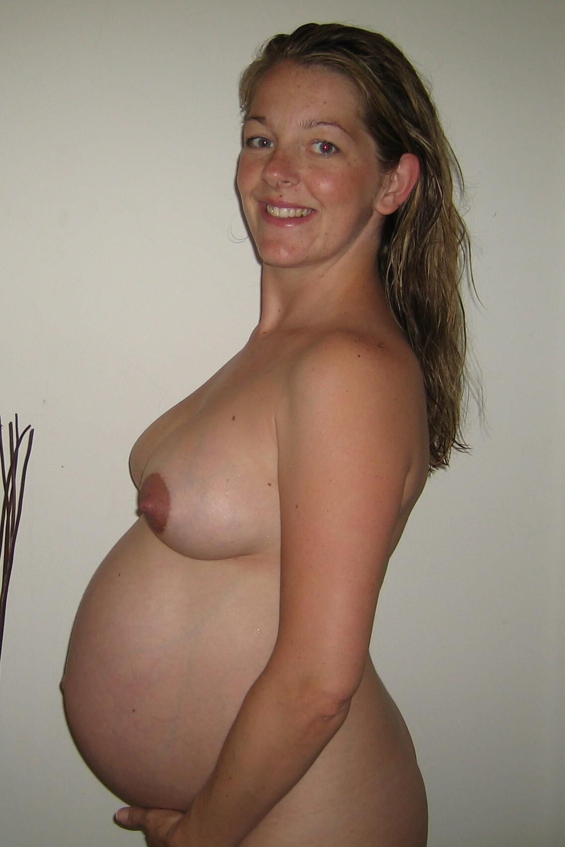 Cute Pregnant Woman Nude Around the House