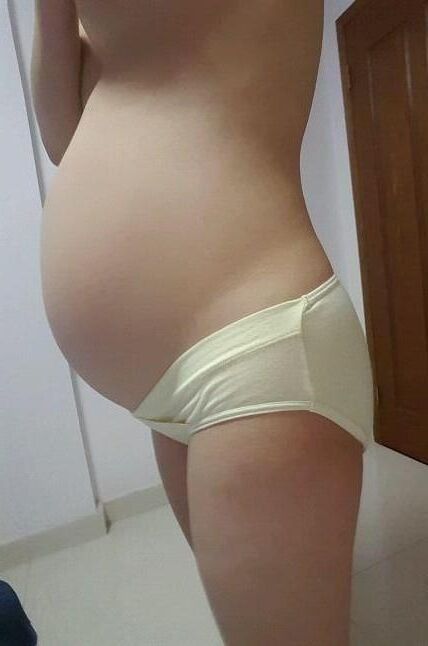 Asian Pregnant Wife