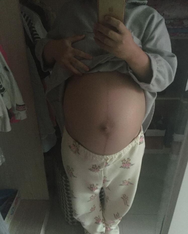 Asian Pregnant Wife