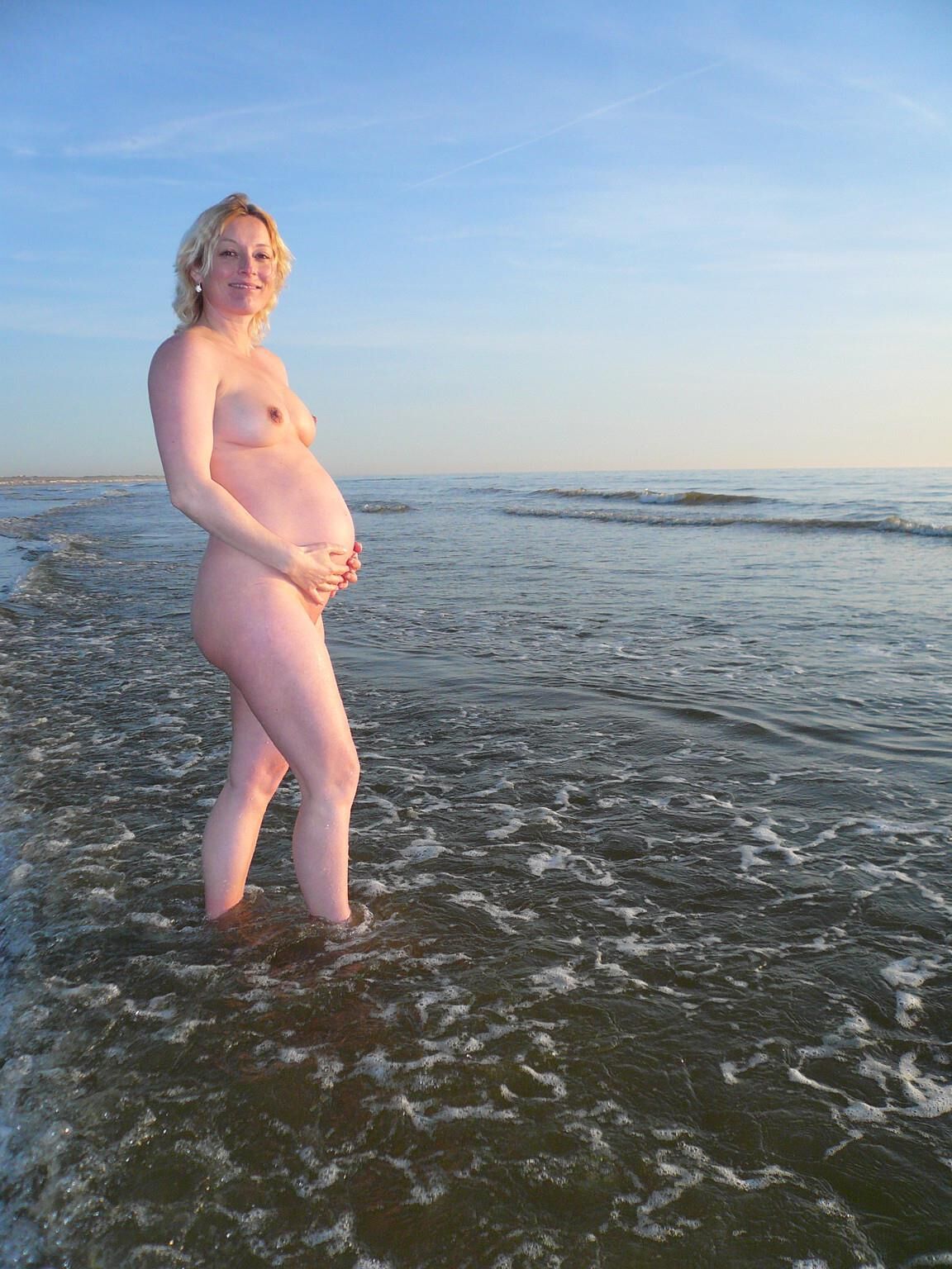 Dutch pregnant wife on the beach