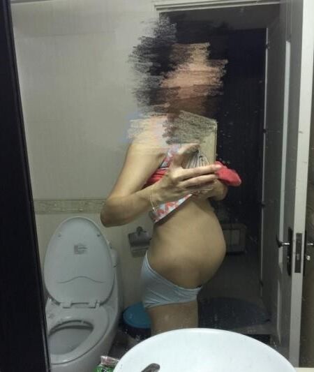 Asian Pregnant Wife