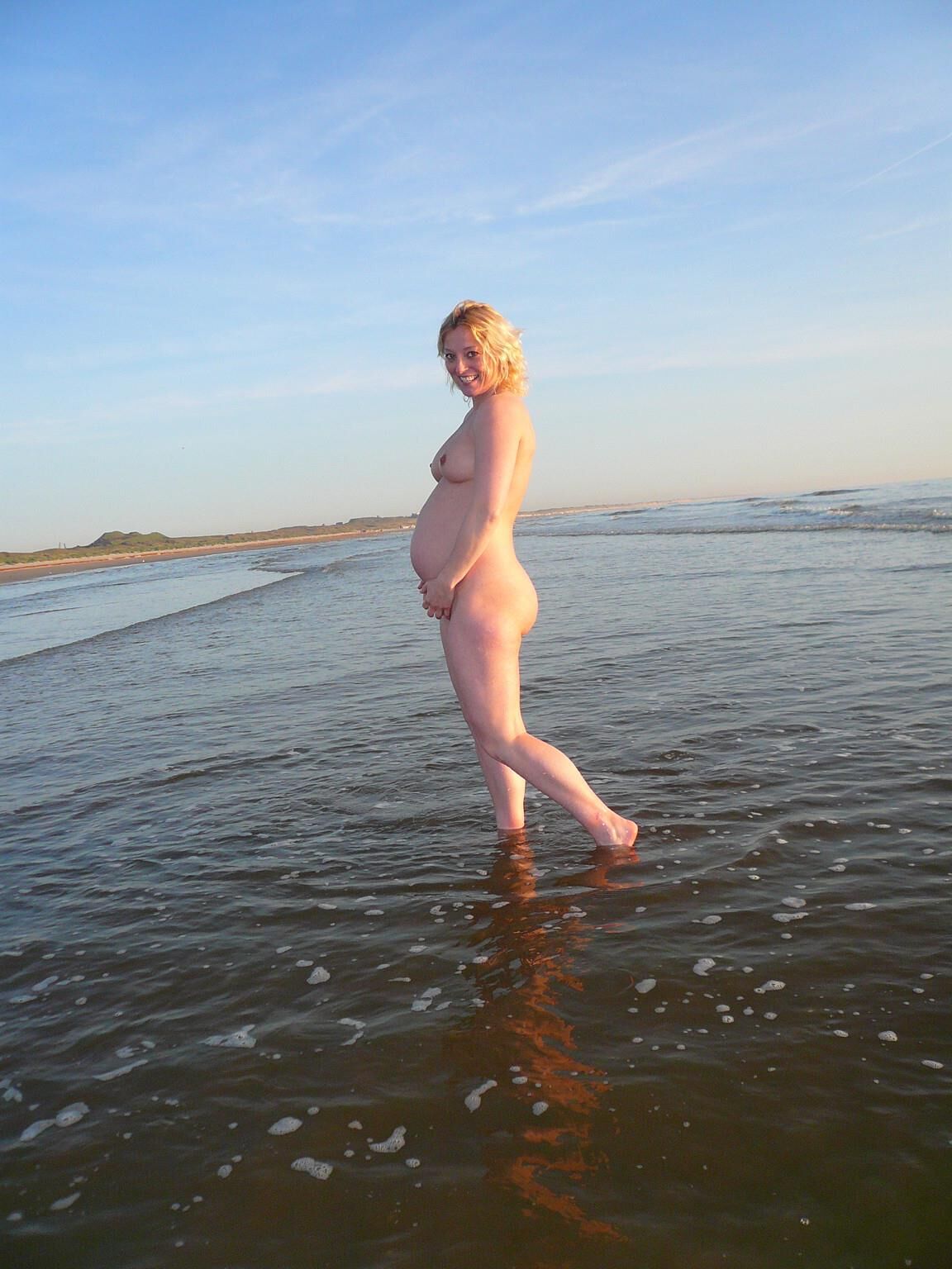 Dutch pregnant wife on the beach