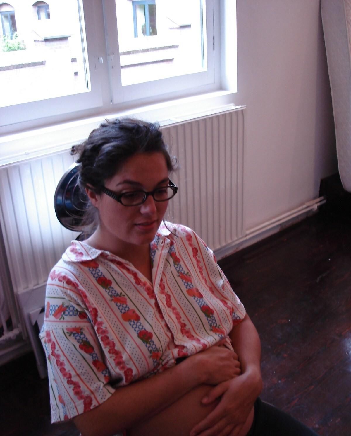 Pregnant lady posing during bath and in her apartment