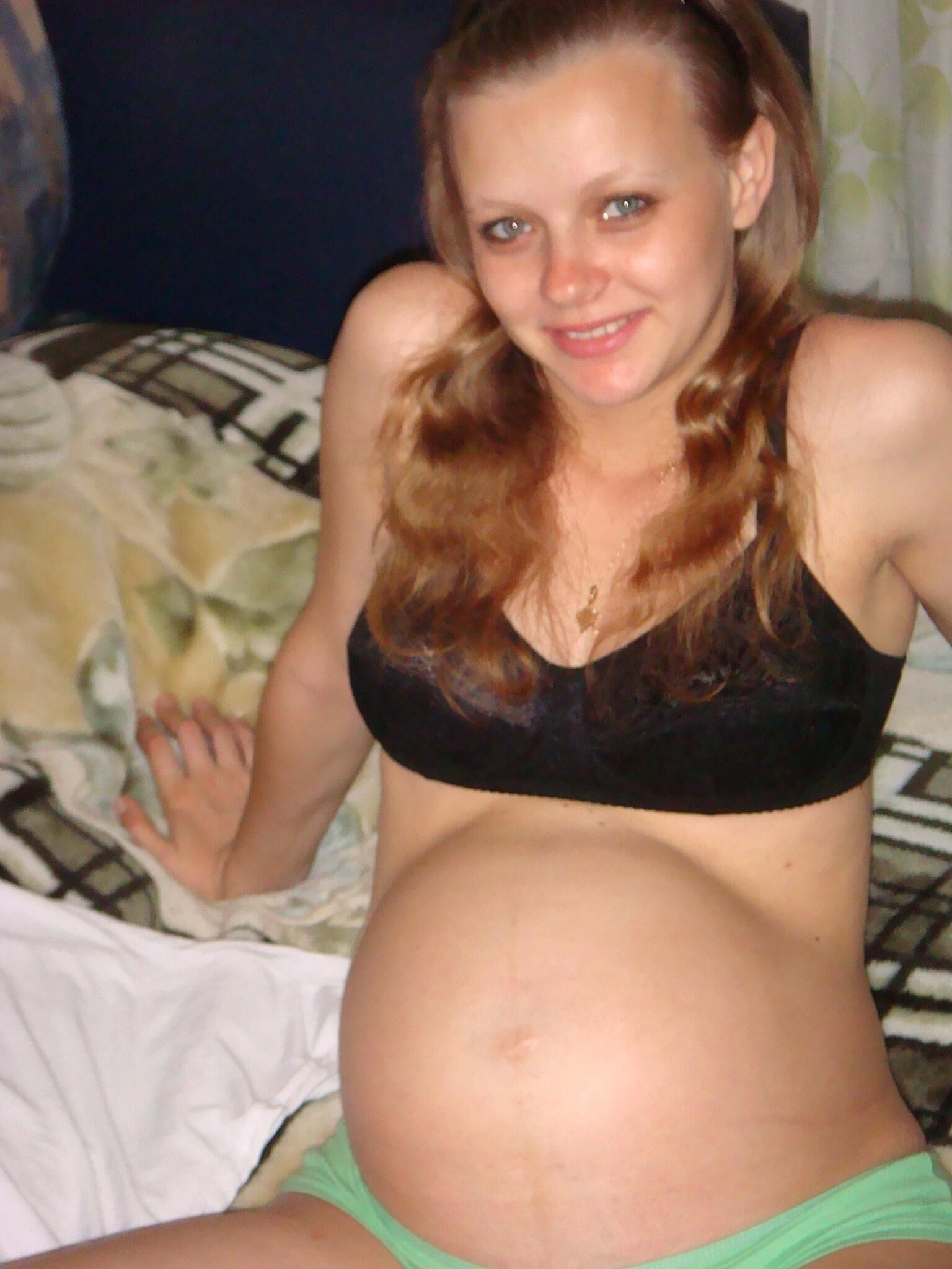 Pregnant babe posing with her nice belly