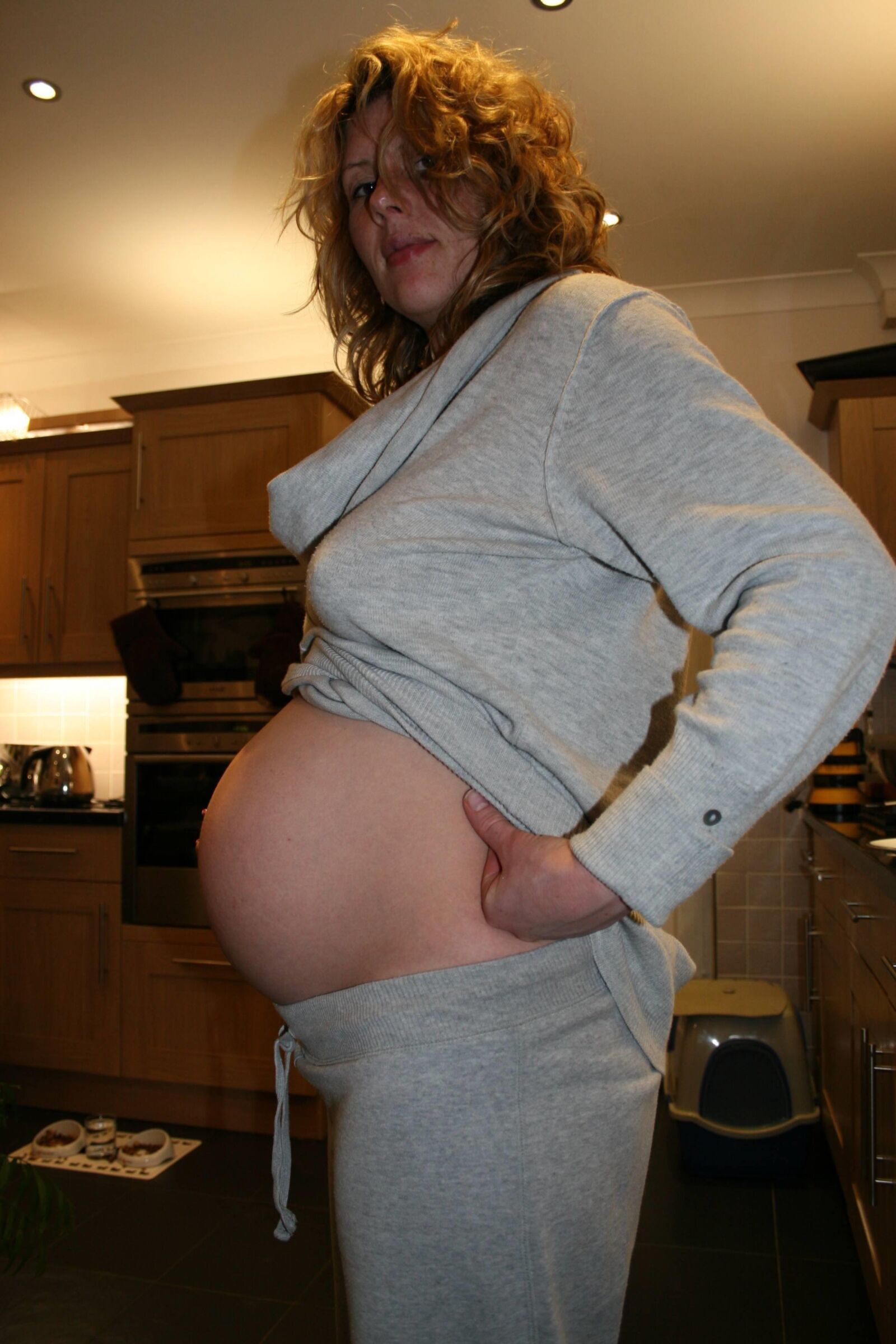 Pretty pregnant blonde wife