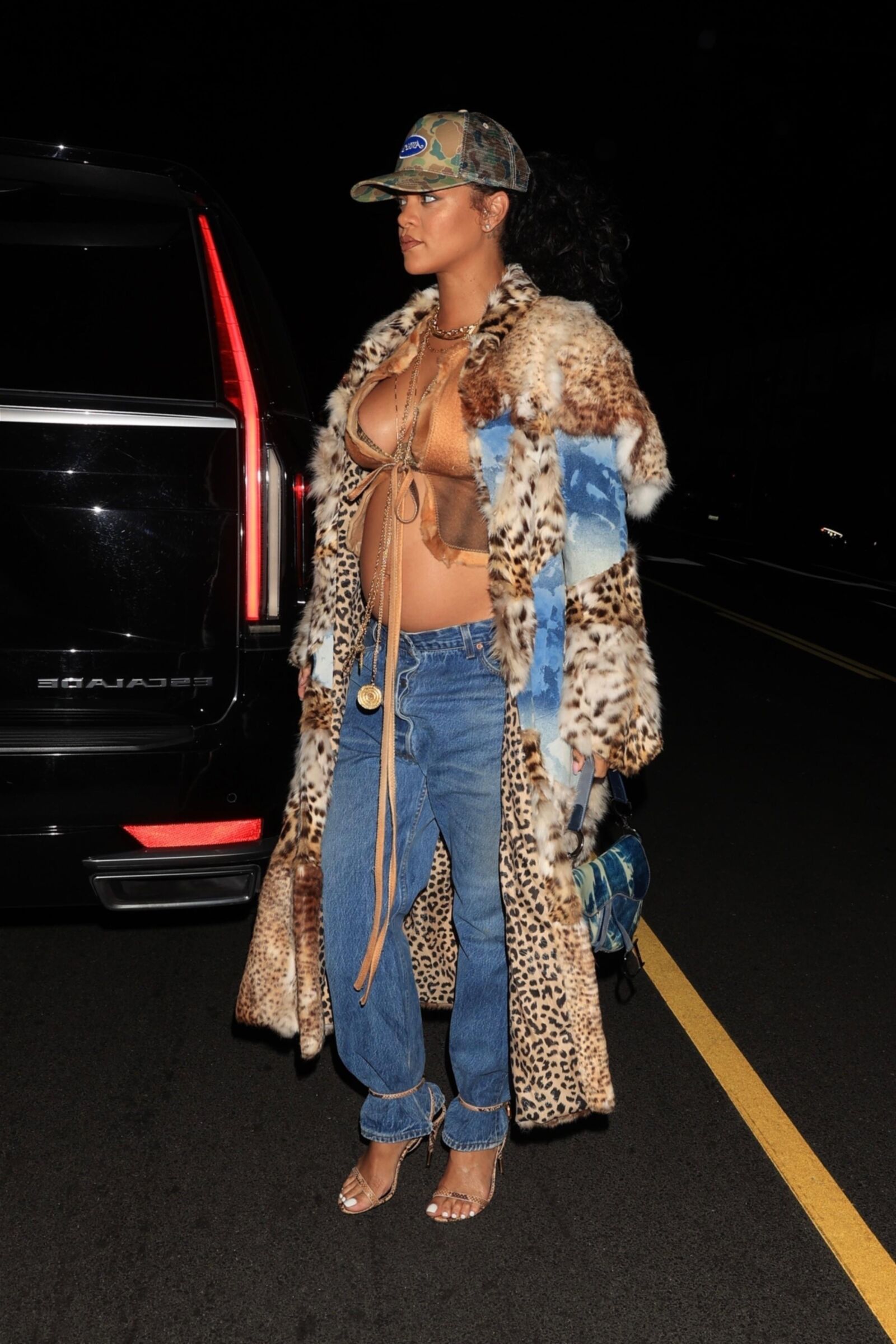 Rihanna shows off her belly bump while out to late night dinner