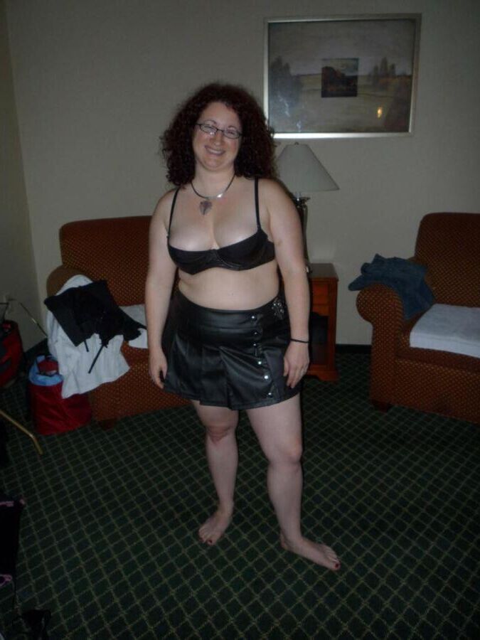 Chubby and pregnant milf with curly hair