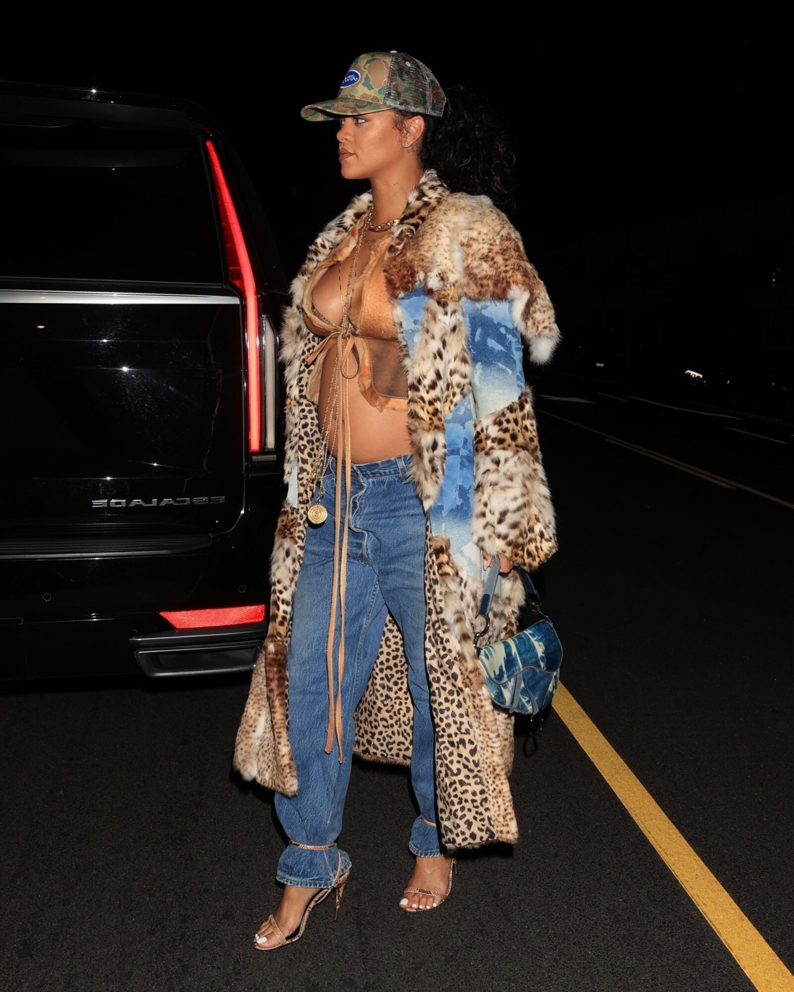 Rihanna shows off her belly bump while out to late night dinner