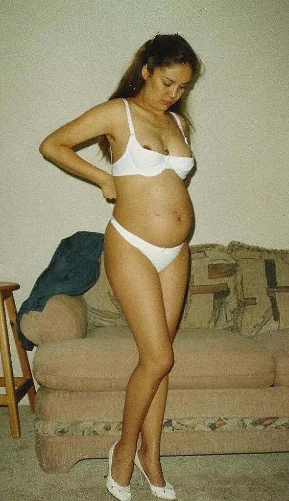 Some older photos of a Pregnant and Horny Woman