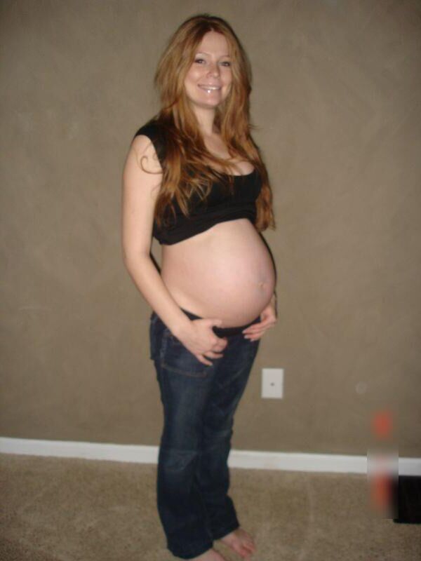 Pregnant redhead